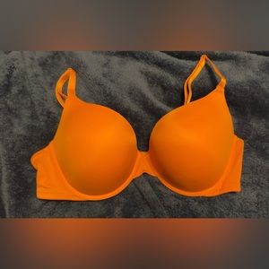 Brand new PINK wear everywhere push-up bra in burnt orange.